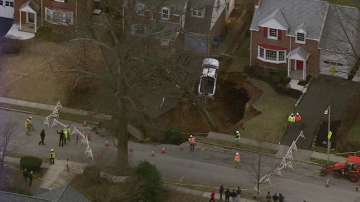 Large Sinkhole Swallows A Yard In Cheltenham (6 pics)