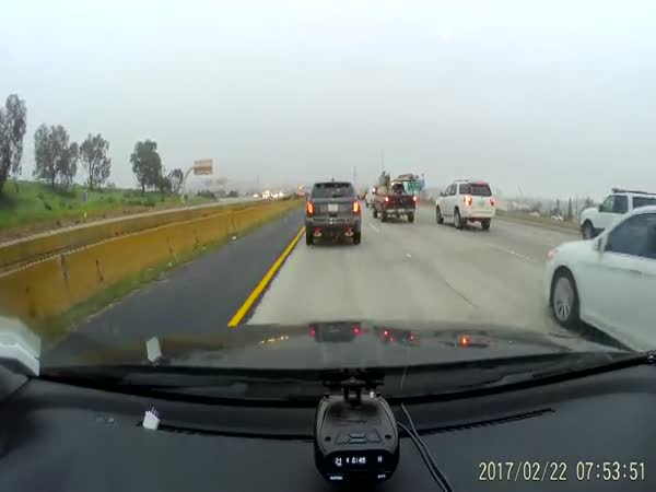 Driver Finds Instant Karma While Changing Lanes