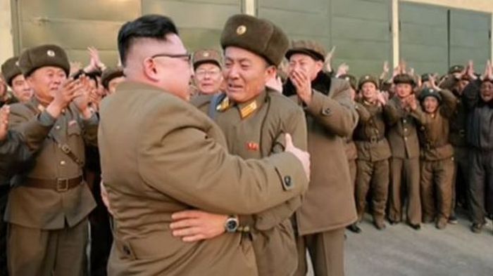 Kim Jong-Un Gives A Soldier A Piggyback Ride (4 pics)