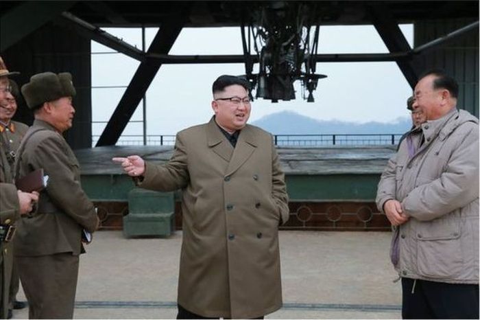 Kim Jong-Un Gives A Soldier A Piggyback Ride (4 pics)