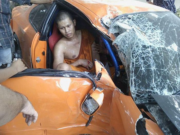 Buddhist Clergyman Wraps Sports Car Around A Tree (5 pics)