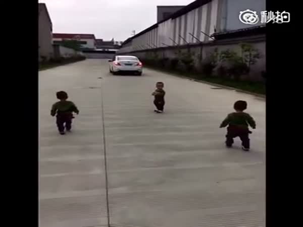 Heart Melting Triplets Toddle Behind Daddy's Car As He Leaves For Work