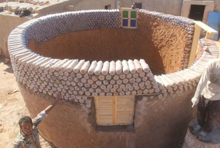 Guy Builds Houses Out Of Plastic Bottles In Algeria (8 pics)