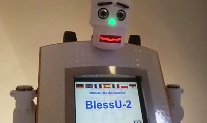 Robot Priest Grants Auto Blessings In German Town (3 pics)