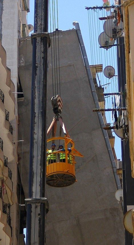 High Rise Building Falls Into A House In Egypt (6 pics)