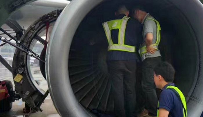 Plane Delayed For Hours After Elderly Woman Throws Coins Into The Engine (3 pics)
