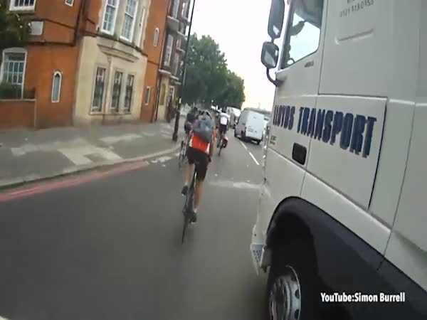 Dramatic Helmet-Cam Footage Shows Cyclist Being Knocked Off The Road And Almost Crushed By Lorry At Busy Junction