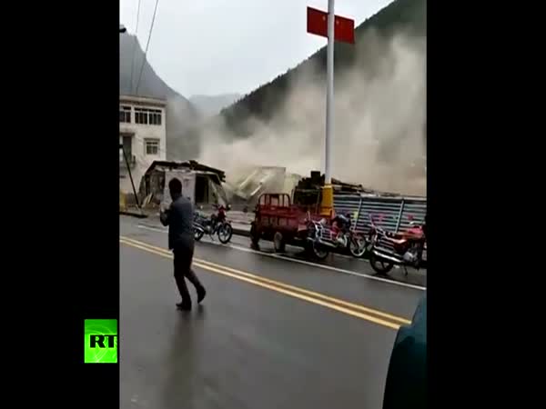 Caught On Cam Building Collapses Into River After Heavy Rains In Tibet
