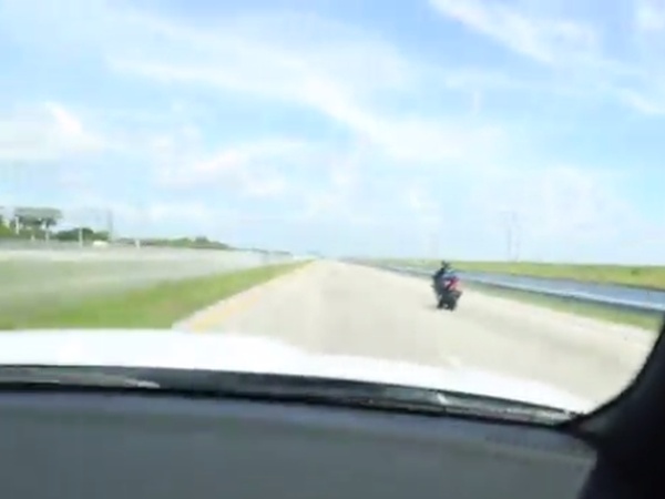 Biker Babe on a Hayabusa Trolls a Dodge Challenger Hellcat