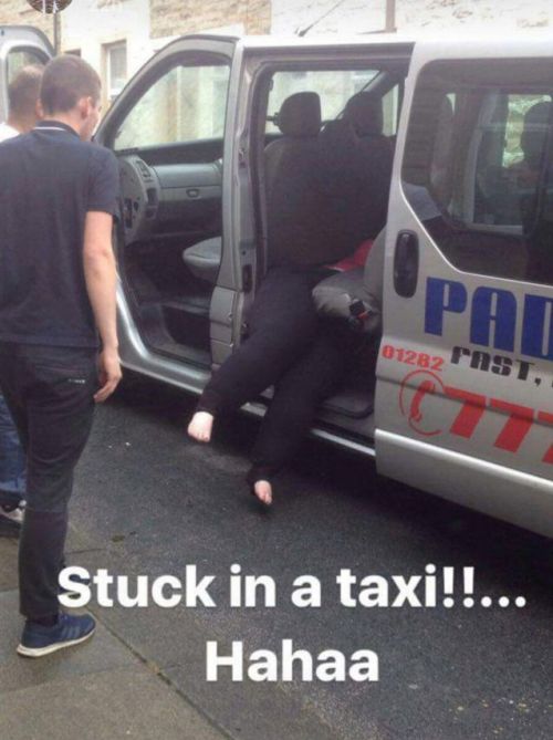 Firefighters Rescue Woman Stuck In A Taxi (2 pics)