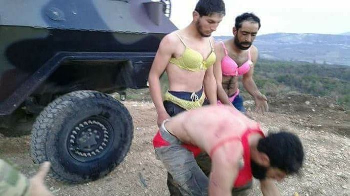 Turkish Military Detains Crossdressing Group Of Syrians (5 pics)