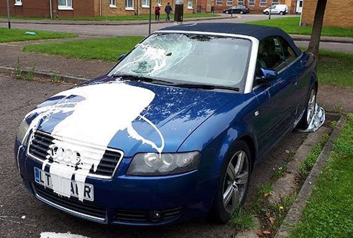 Woman Destroys Car To Get Revenge On A Cheater (3 pics)