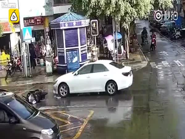 Schoolboy Scooter Rider Lands on His Feet After Car Smashes Into Him