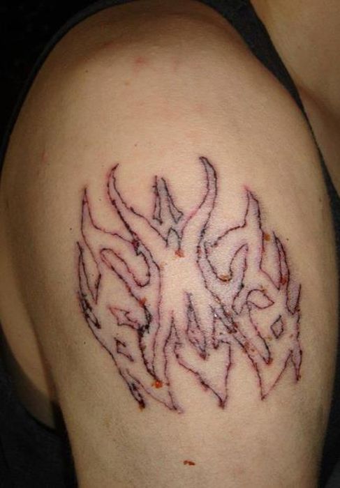 The Worst Tattoo Artist Ever (14 pics)