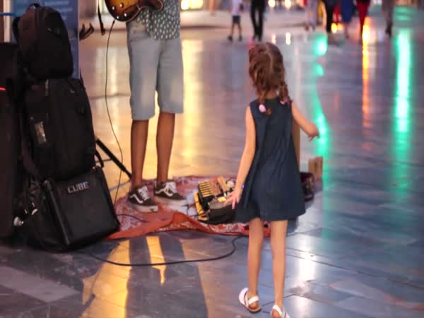 Little Girl Stuns Street Musician With Her Dance