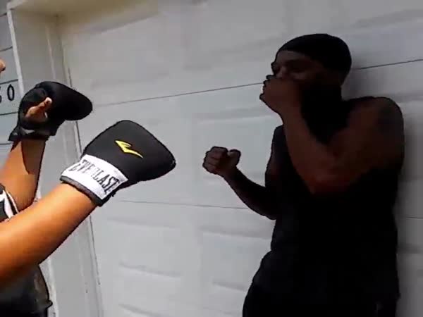 Girl Hits Boxing Coach