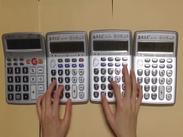 Super Mario Theme Played by Four Calculators