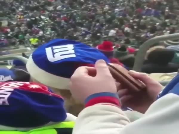 Drunk Football Fan Passes Out And Get's His Beer Stolen