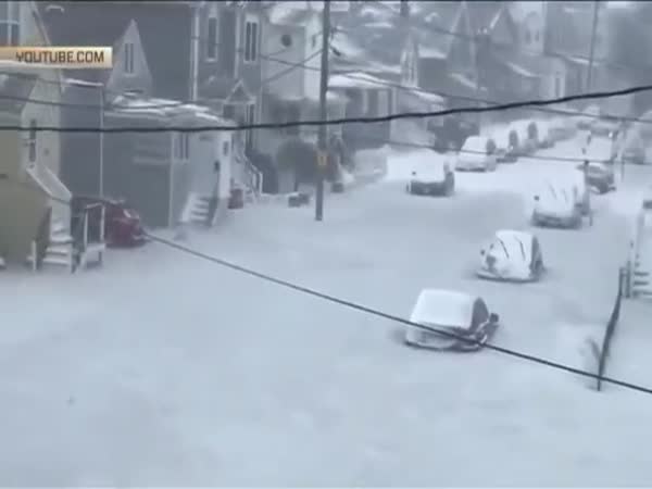 Frozen Floodwaters Form Street of Solid Ice Near Boston