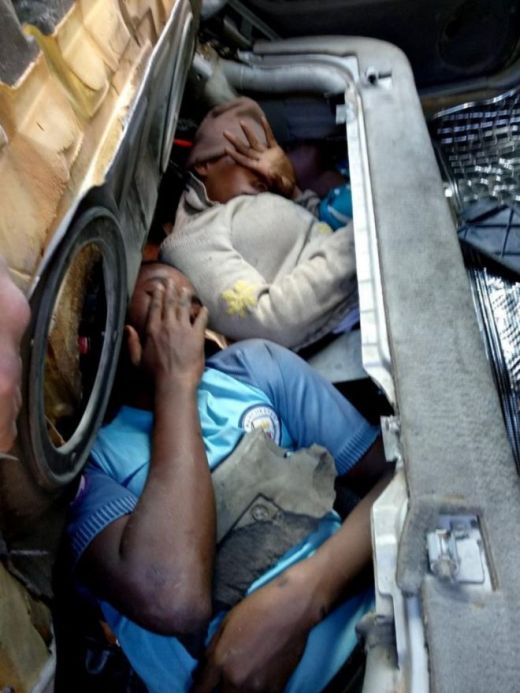 Migrants Hiding Underneath A Car's Bonnet And Seats (2 pics)
