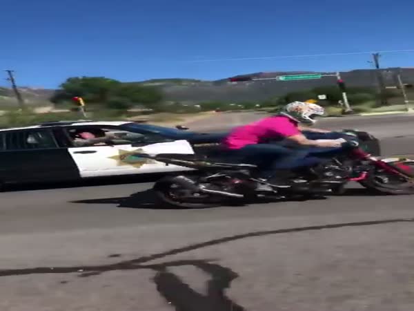 Cop Pulls Gun On Motorcycle For Wheelie