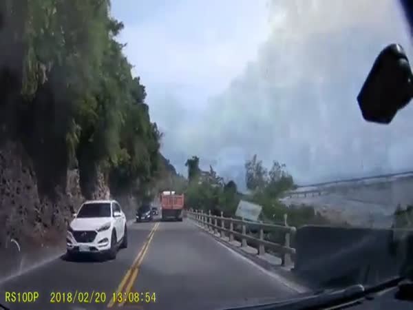 Massive Stone Hits and Almost Crushes Car