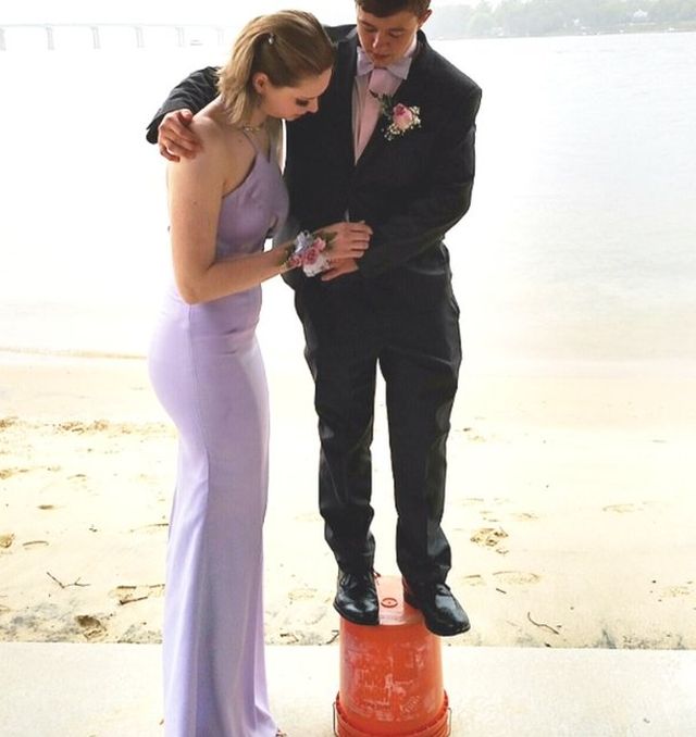 This Couple Has A Problem. The Boy Is 173cm (5'8) tall (2 pics)