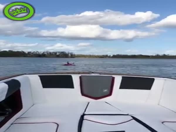 Kayaker Surfing Behind Wakeboats