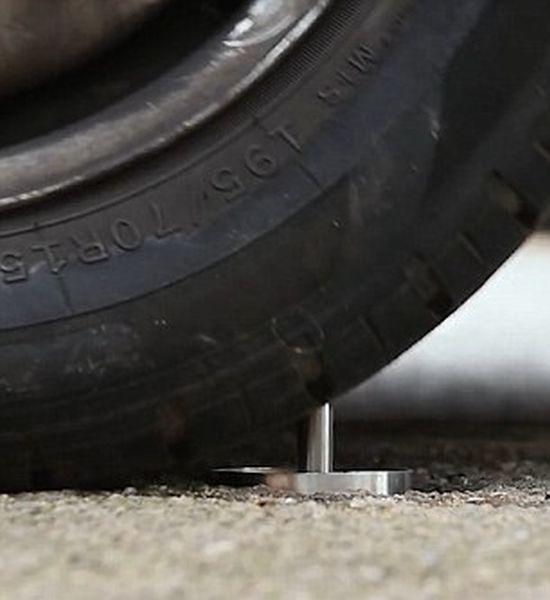 CatClaw Gives Cars Flat Tyres By Puncturing Them With A Sharp Steel Spike (5 pics)
