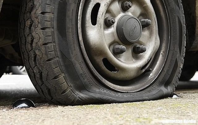 CatClaw Gives Cars Flat Tyres By Puncturing Them With A Sharp Steel Spike (5 pics)