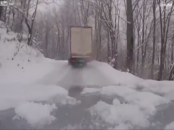 Lorry Swerves And Skids Along An Icy Mountain Road In Bosnia