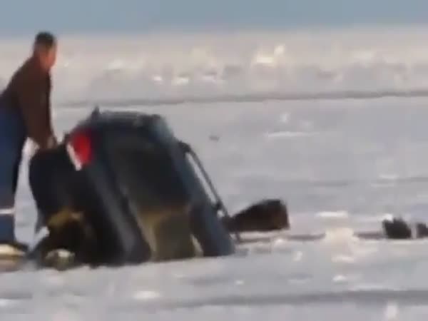 Car Plunges Into Frozen Lake