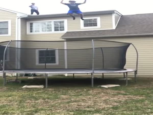 Kid Jumps Off The Roof Onto a Trampoline