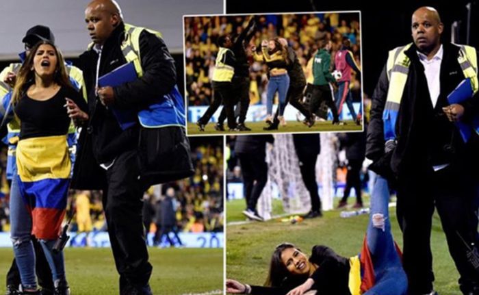 Girl Interrupts Colombia vs Australia Game (4 pics)
