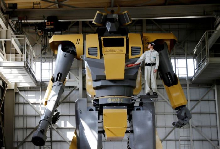 Japanese Engineer Builds Large Robot With A Gun (15 pics)