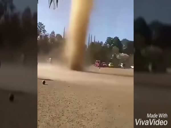 Dust Spins to Form a Tornado in The Middle of The Field