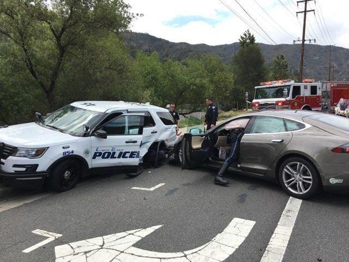 Tesla Autopilot Smashed Parked California Police Ford (3 pics)