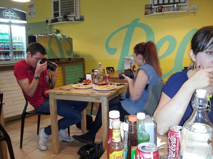 Photos Of People Taking Pictures Of Food (16 pics)