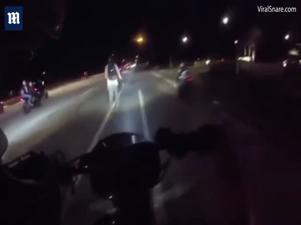 Biker Suffers Spectacular Crash While Doing Wheelie On Highway