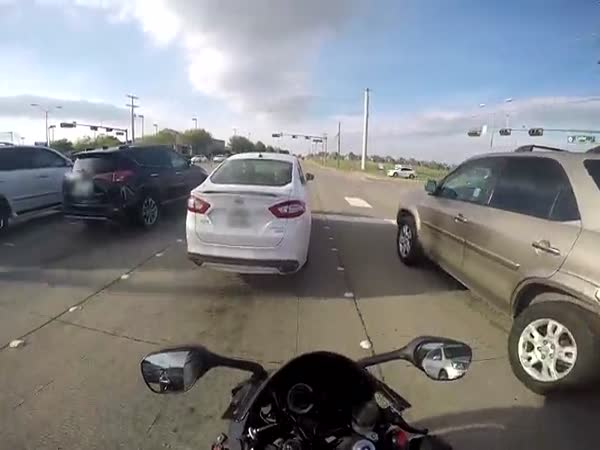 Motorcyclist Is Lucky To Make It Out Alive