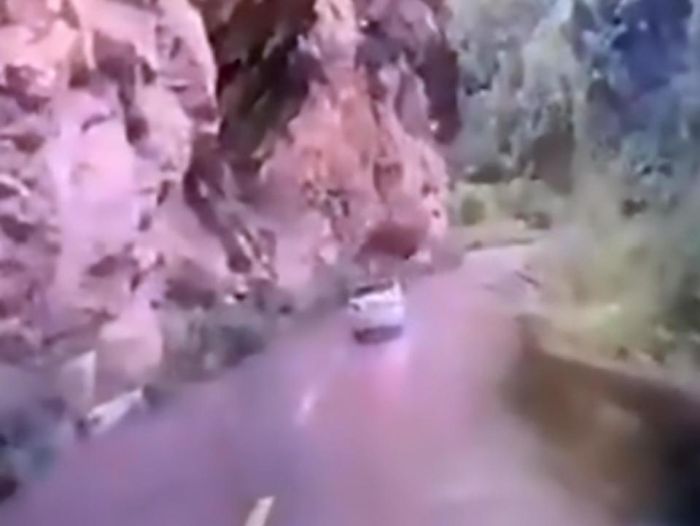 A Huge Falling Boulder Lands On Car (3 pics + video)