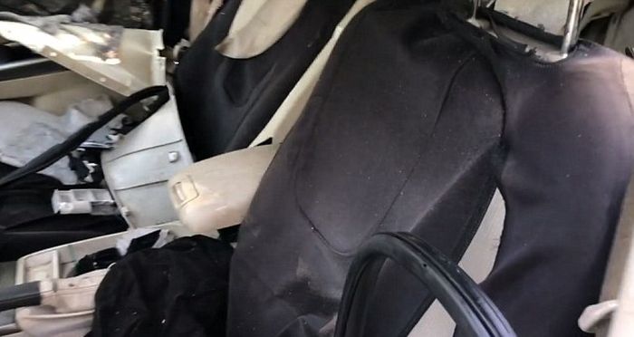 Black Bear Destroys A Car (5 pics)