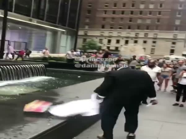 Big Uber Driver Throws Small Man Into Fountain In New York City