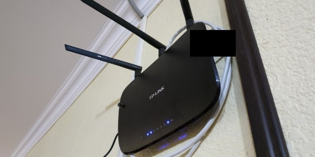 How NOT To Attach A Router To The Wall (3 pics)