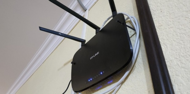 How NOT To Attach A Router To The Wall (3 pics)