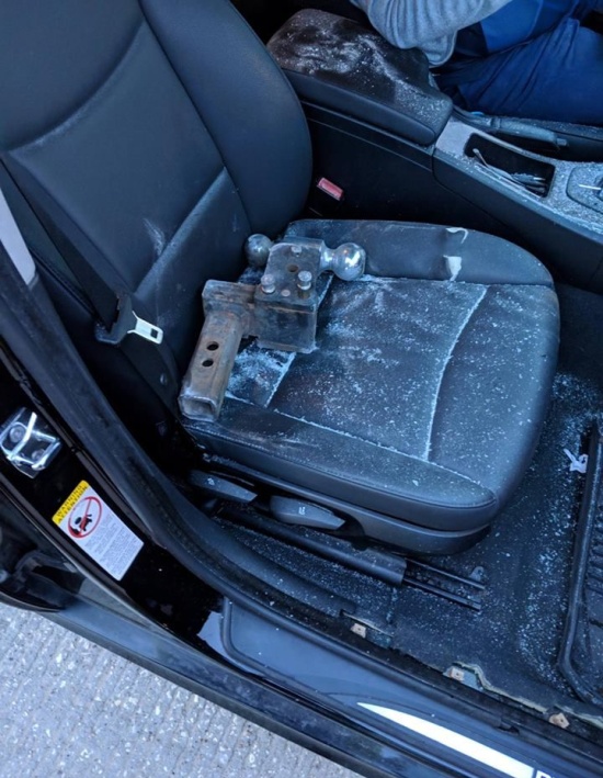 Flying Tow Hitch Hits Car On I-45 (2 pics)