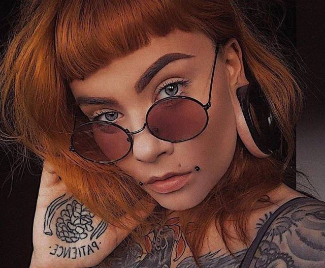 Girls Who Love Piercings And Tattoos (28 pics)