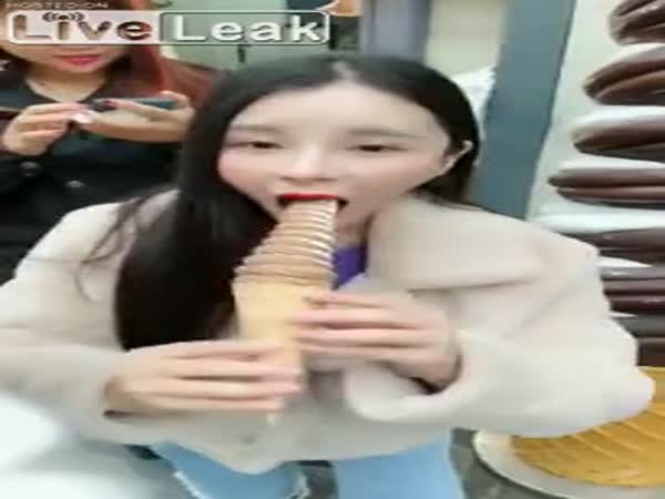 Miniature Asian Girl With A Big Ice Cream