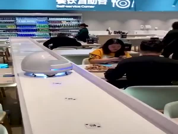 This Restaurant Has Little Robots That Deliver Your Food