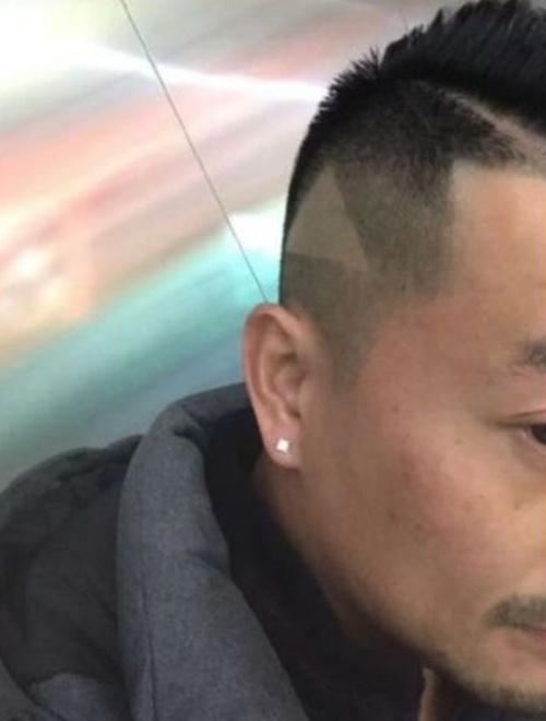 Chinese Man Gets Shaven 'Play' Icon After Showing Hairstylist Paused Video (3 pics)